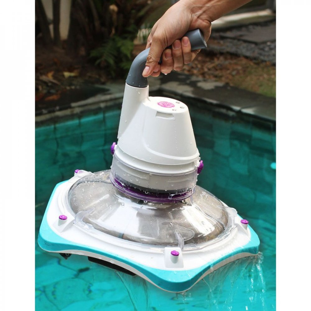 Holding A Telsa™ Cordless & Rechargeable Pool & Spa Cleaner