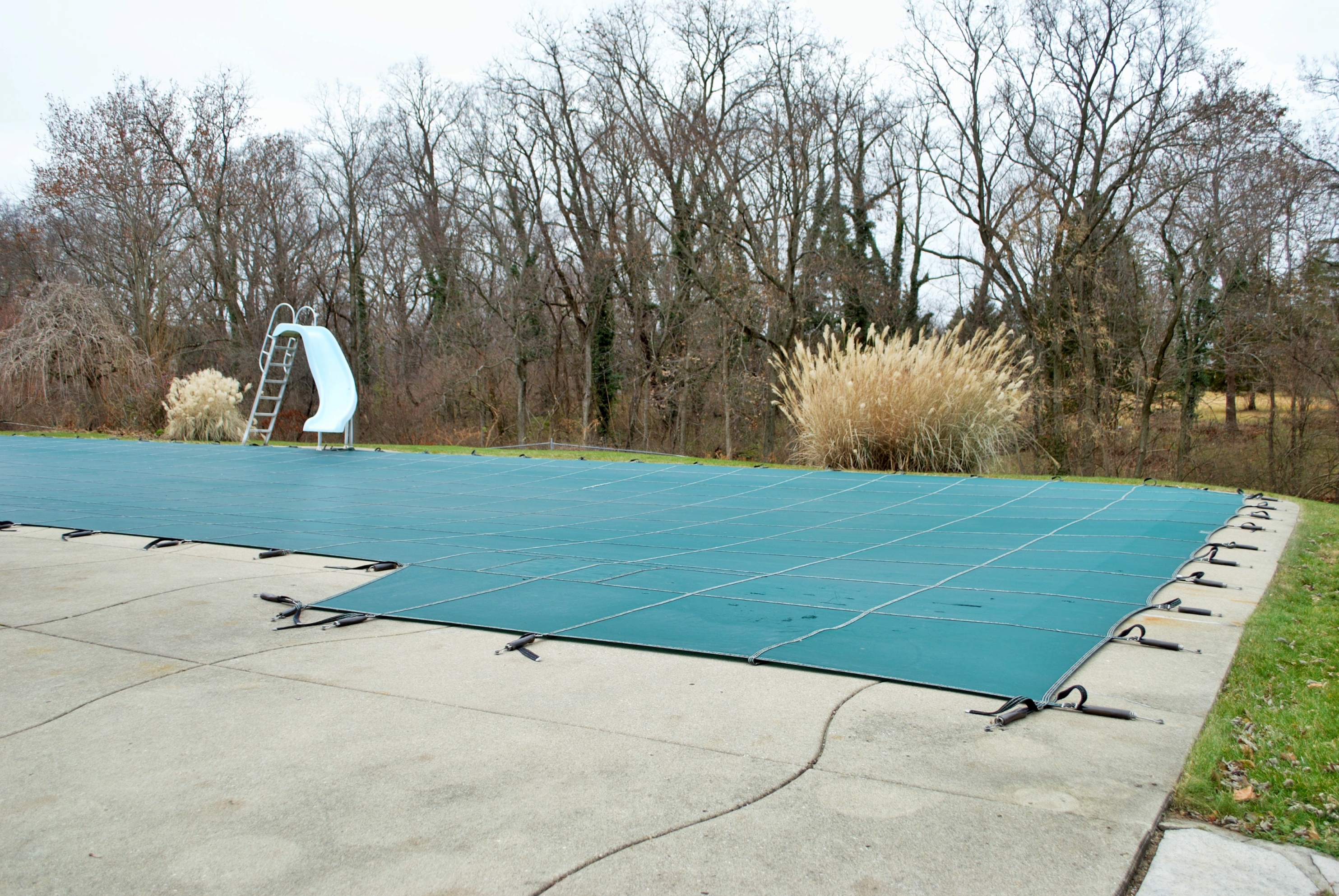 A pool that has been closed for the winter