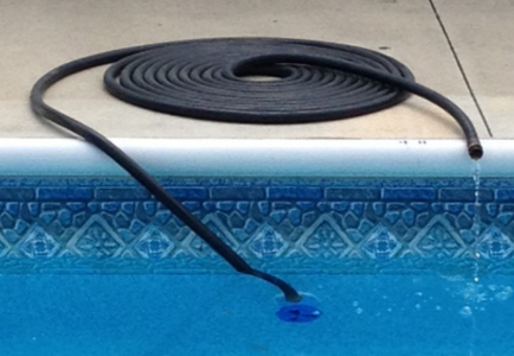 Hose On Pool Deck