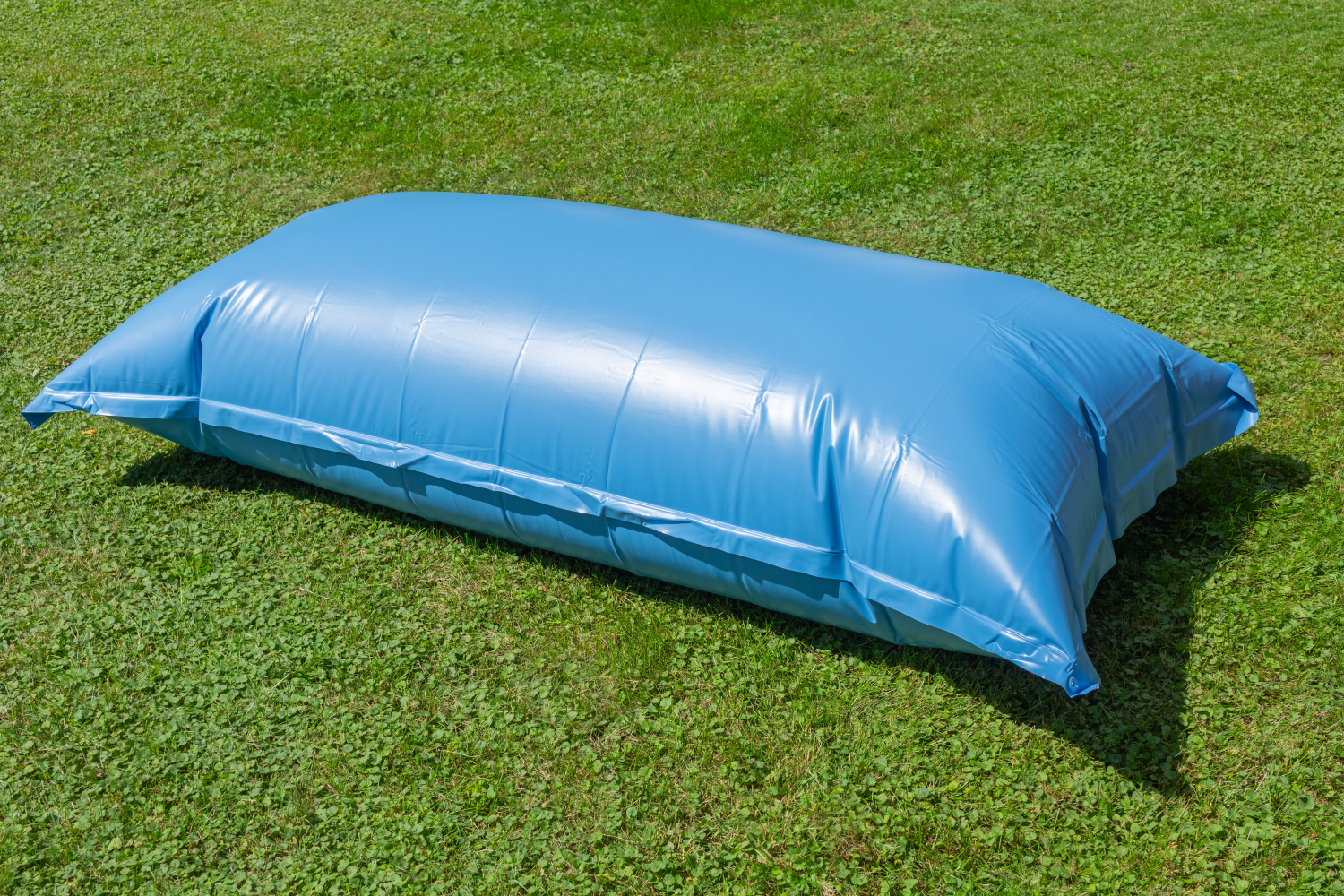 An air pillow ready to go in a pool