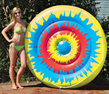 Woman Standing Up Swimline® Tie Dye Island Inflatable Pool Float